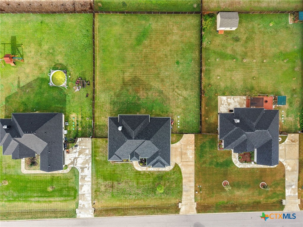 223 Sand Flat Lane Temple, TX 76502 - Photo 32 of 33 an aerial view of houses with a yard