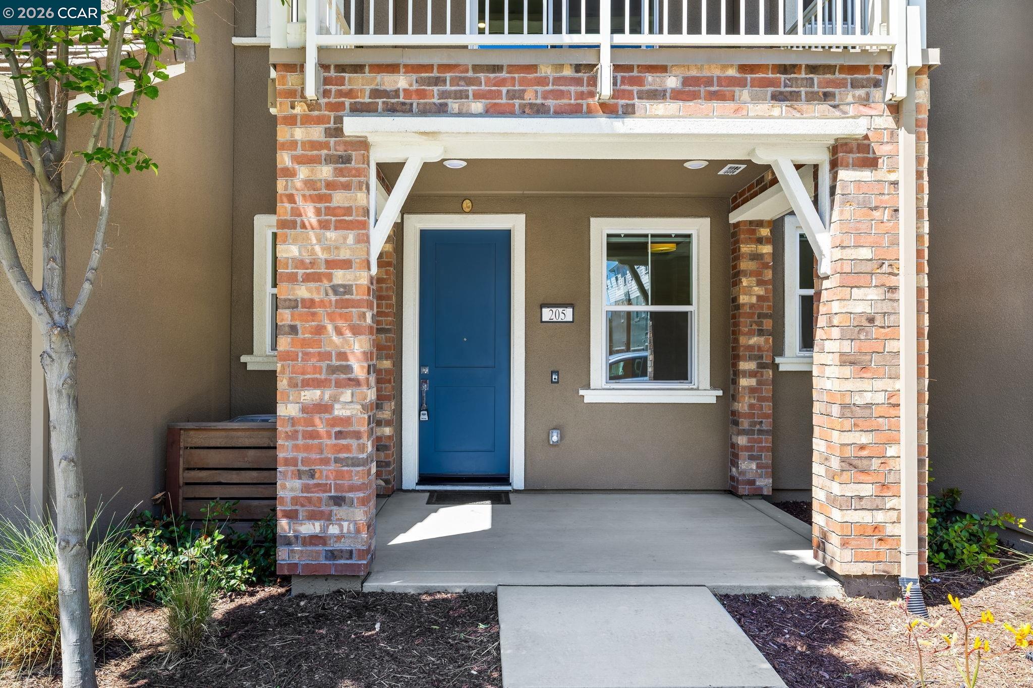 205 Plum Tree Street Livermore, CA 94551 - Photo 14 of 47 a front view of a house with a garage