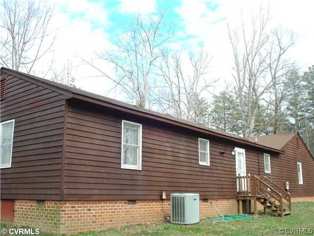 466 Signboard Road Bumpass, VA 23024 - Photo 3 of 12 a front view of house with yard