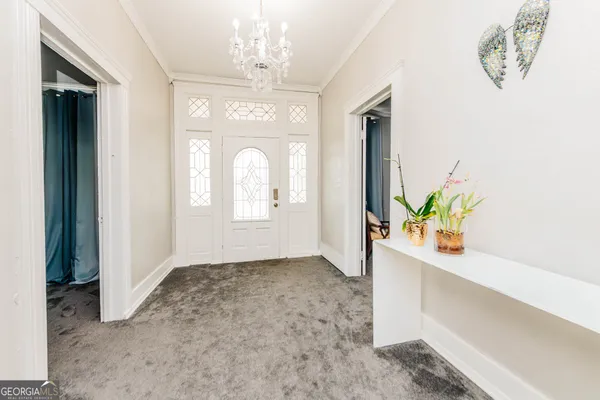 a view of a hallway with entryway