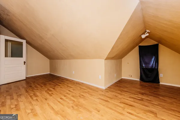 a bathroom with a bathtub and toilet