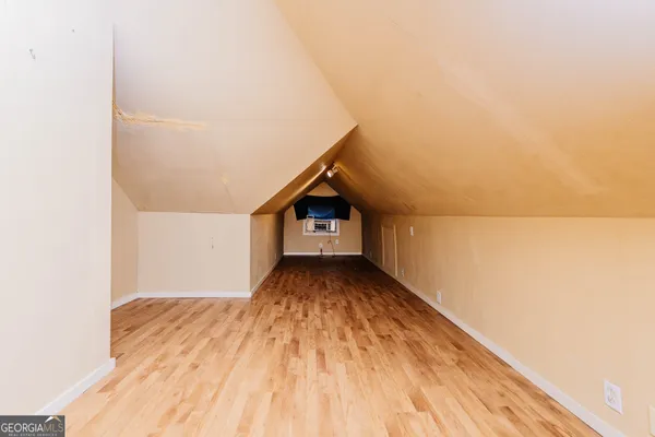 a bathroom with a toilet and a sink