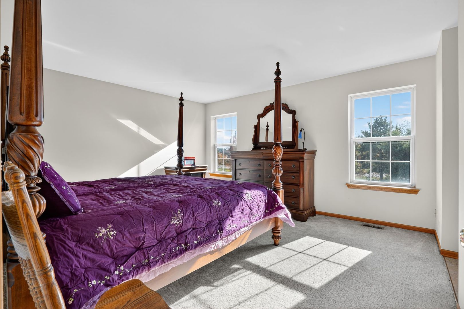 2722 Moraine Valley Road Wauconda, IL 60084 - Photo 25 of 42 a bed sitting in a room next to a window