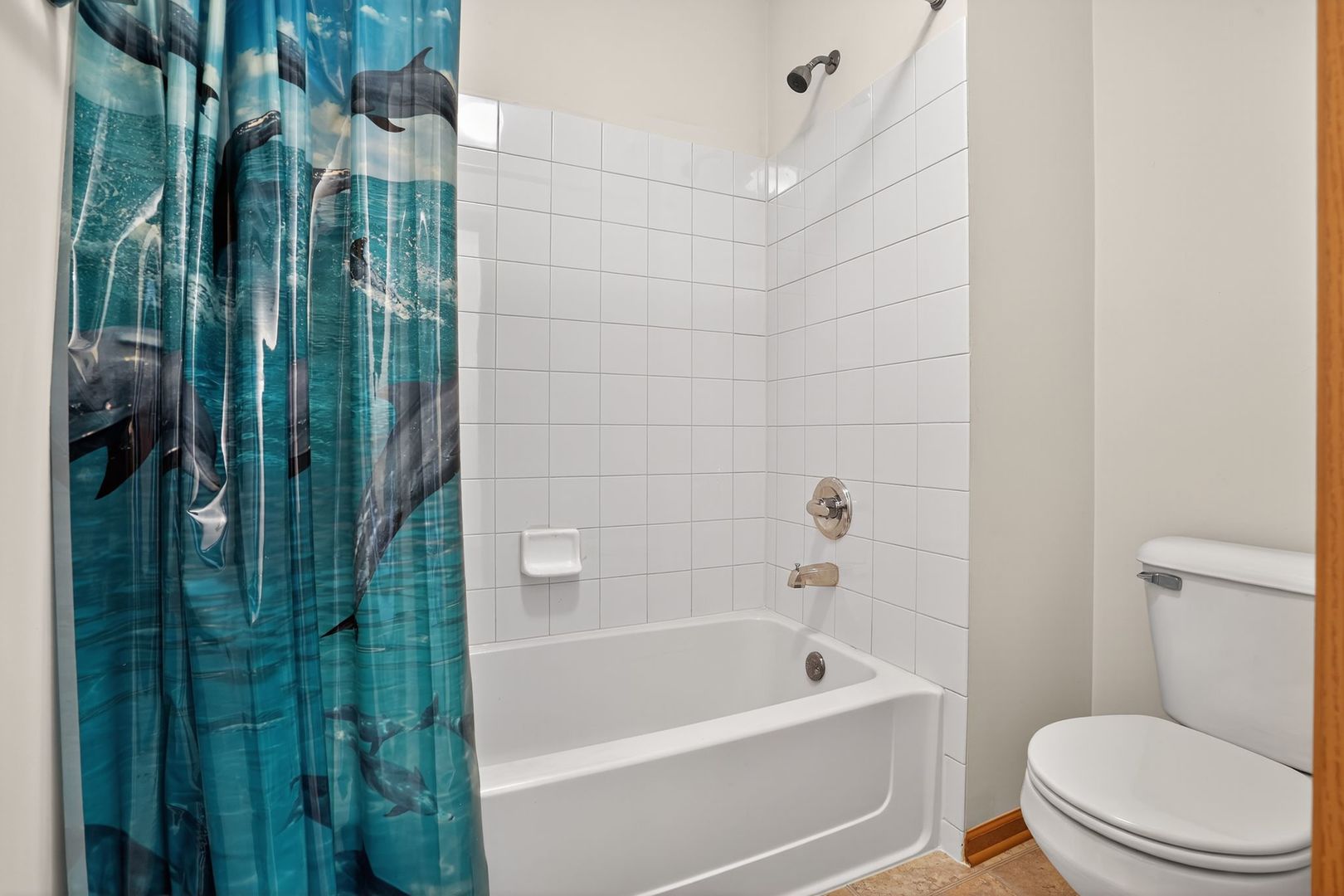 2722 Moraine Valley Road Wauconda, IL 60084 - Photo 37 of 42 a bathroom with a shower a toilet and bathtub