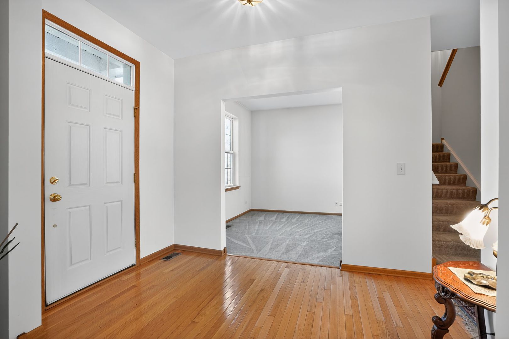 2722 Moraine Valley Road Wauconda, IL 60084 - Photo 5 of 42 a view of a room with wooden floor and bathroom