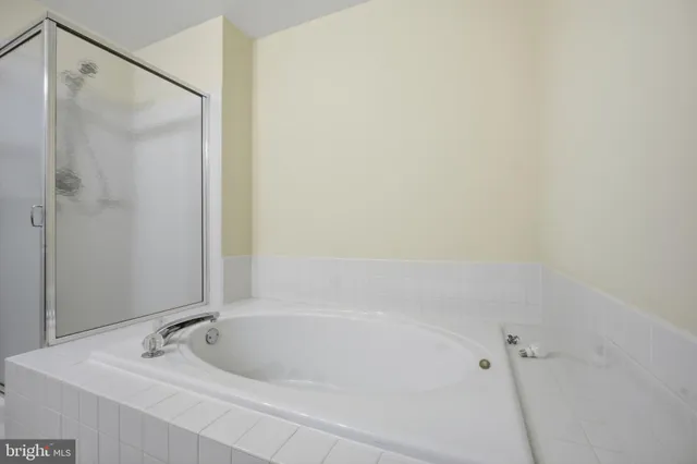 a bathroom with a sink toilet and a mirror