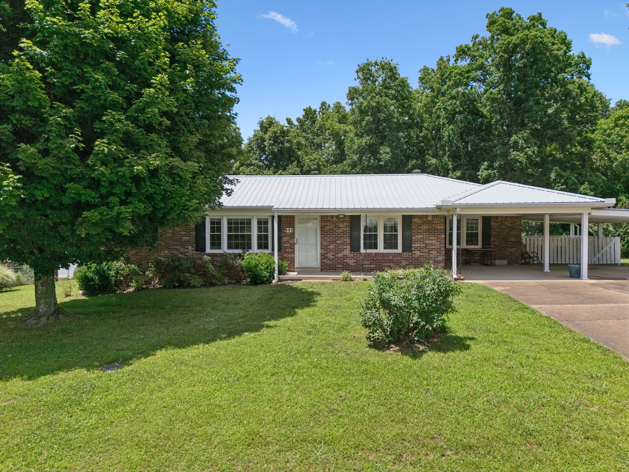 708 Hickory Street Centerville, TN 37033 - Photo 52 of 57 a front view of a house with a yard