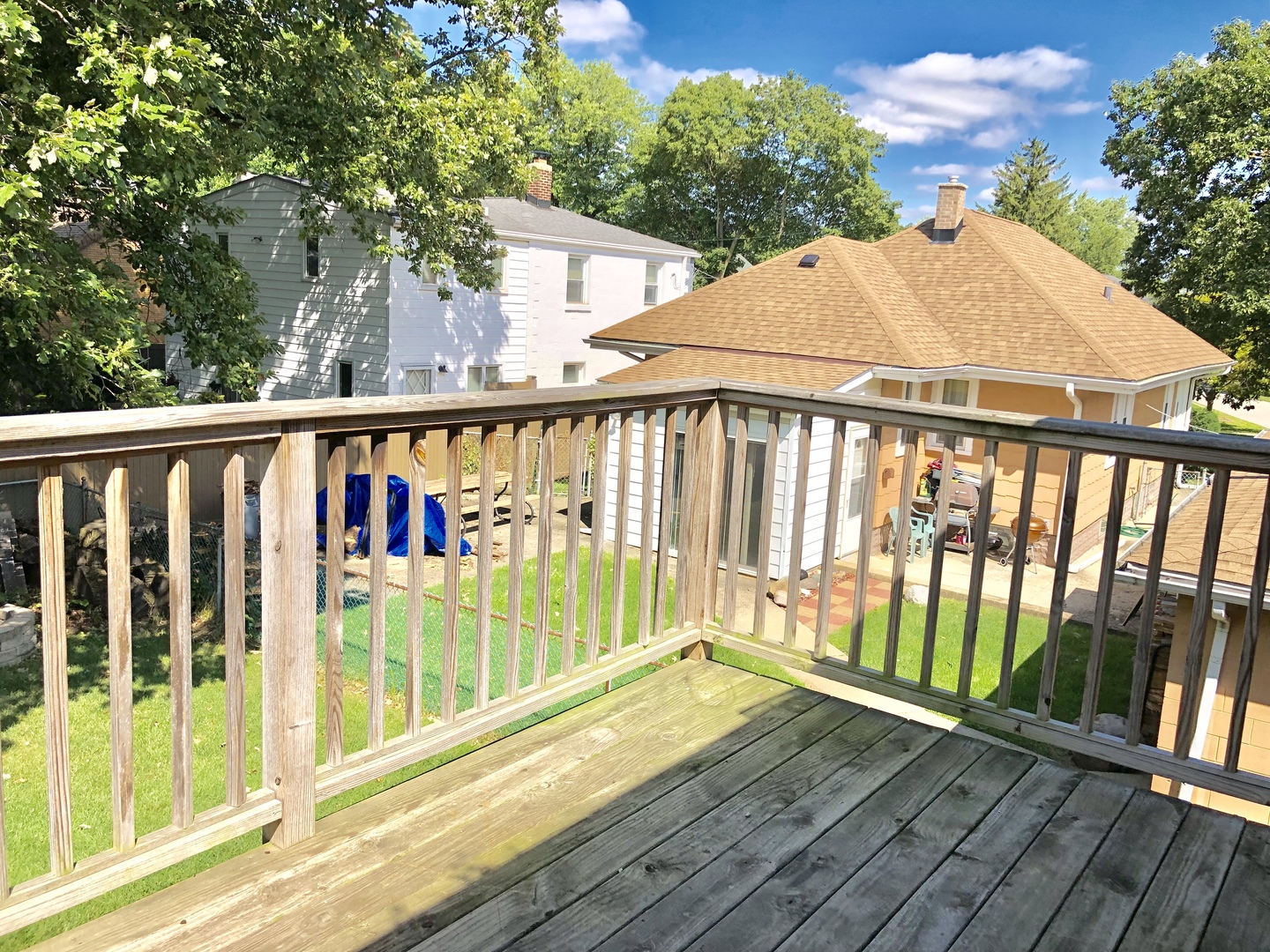 1111 Lincoln Street, Unit 2 Lockport, IL 60441 - Photo 11 of 13 a balcony with wooden floor
