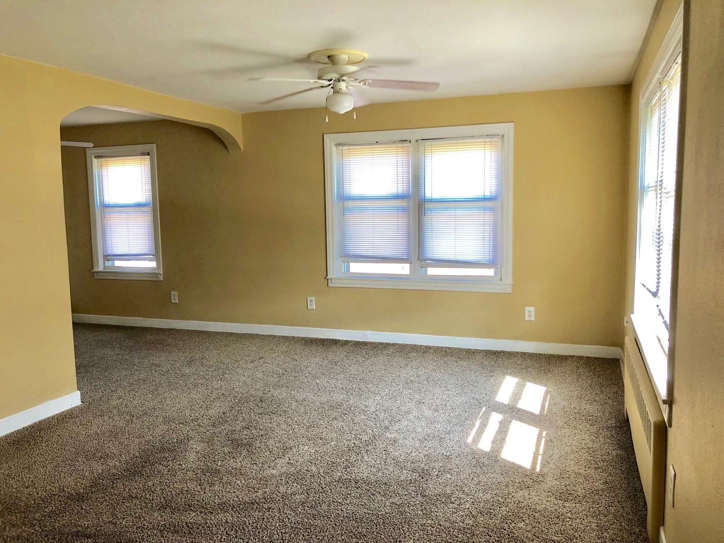 1111 Lincoln Street, Unit 2 Lockport, IL 60441 - Photo 5 of 13 a view of an empty room with a window