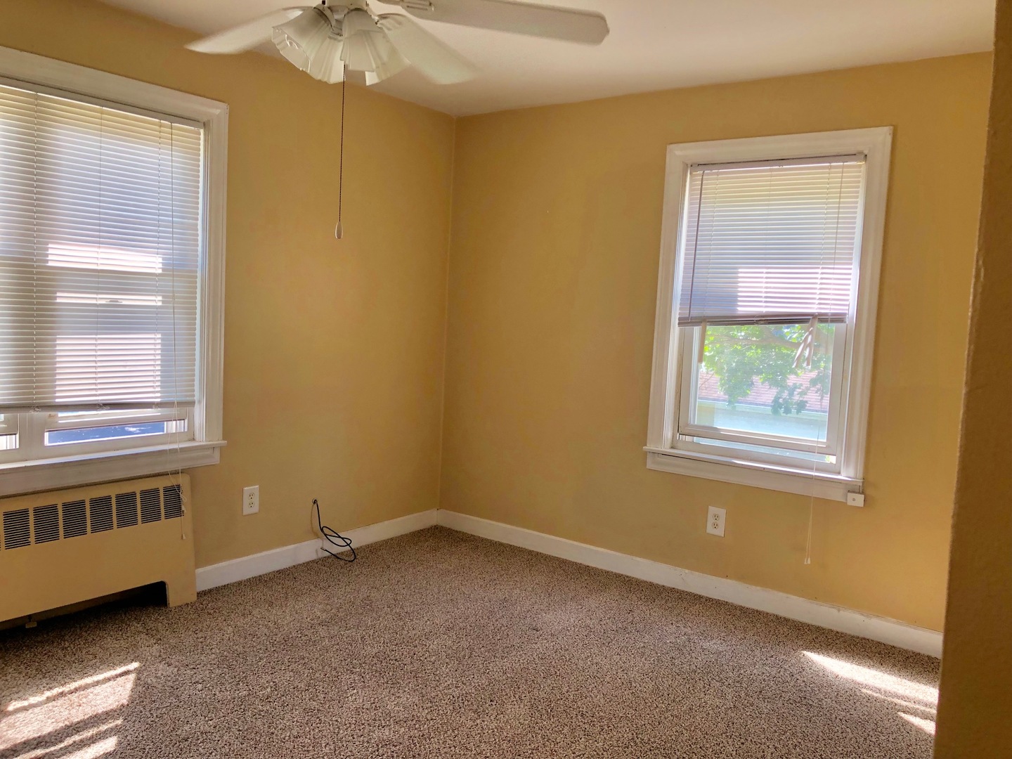 1111 Lincoln Street, Unit 2 Lockport, IL 60441 - Photo 8 of 13 a view of an empty room with a window