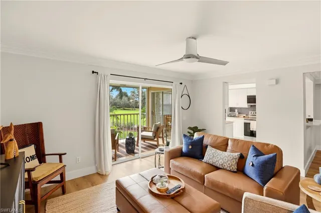 a kitchen with stainless steel appliances granite countertop a sink stove oven and refrigerator