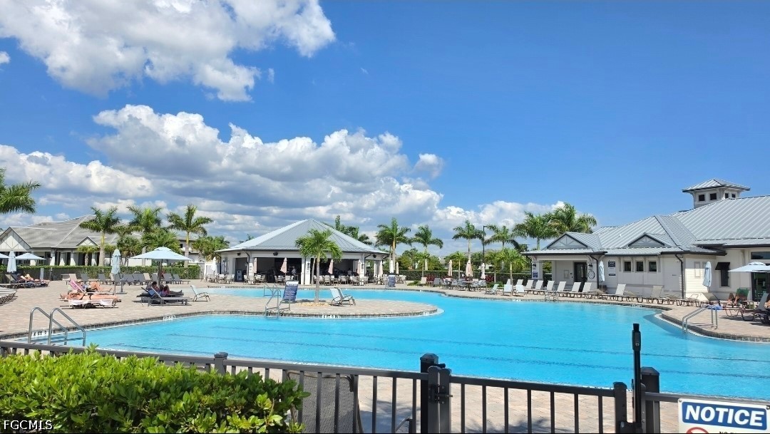 14191 Poppy Fld Loop, Unit 5312 Punta Gorda, FL 33955 - Photo 38 of 41 a view of swimming pool with outdoor seating