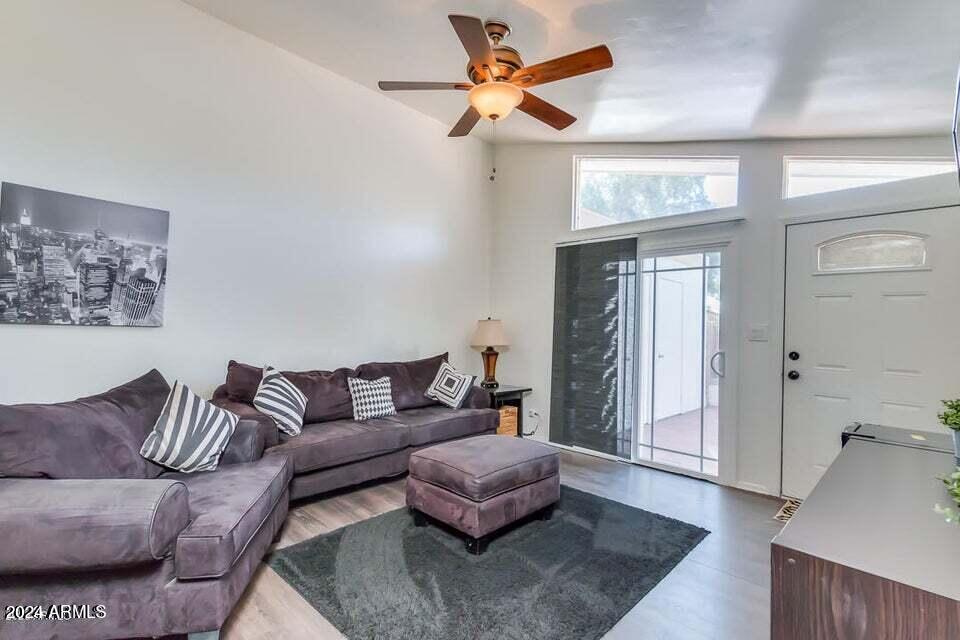 525 North May, Unit 10 Mesa, AZ 85201 - Photo 3 of 21 a living room with furniture and a rug