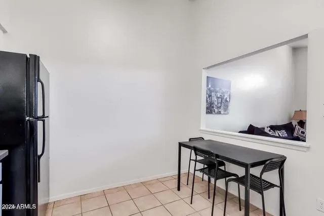 a view of a workspace with furniture