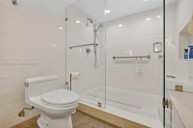 a bedroom with two beds and a window