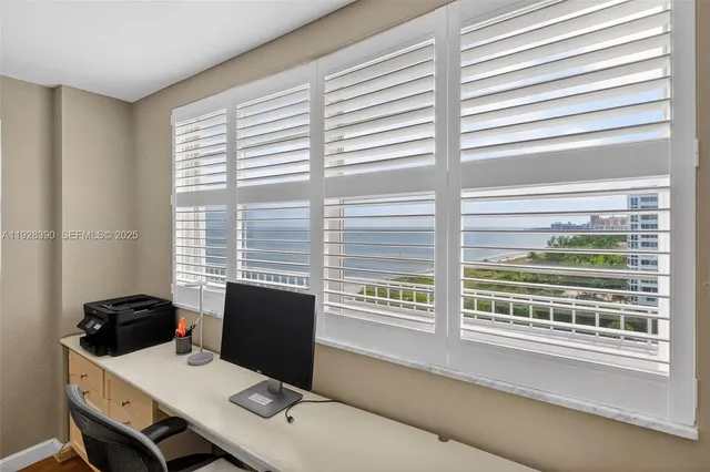 a view of a hallway with washer and dryer