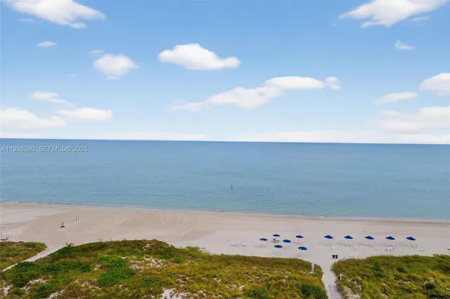 a view of outdoor space with a lake view