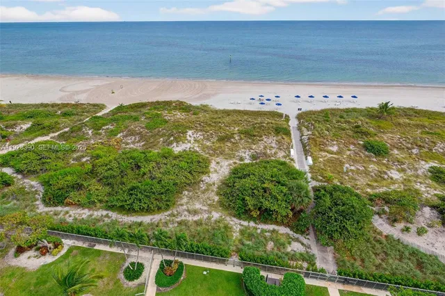 a view of a living room and dining room