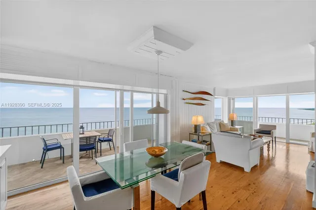 a kitchen with lots of counter top space sink and wooden floor