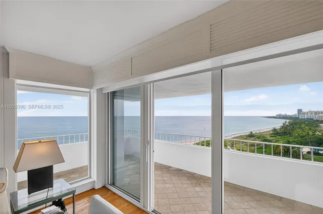 a kitchen with stainless steel appliances granite countertop a sink and a refrigerator