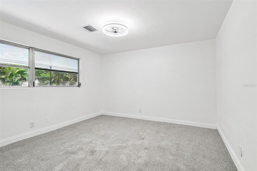 6016 Arthur Avenue New Port Richey, FL 34653 - Photo 12 of 33 an empty room with a window