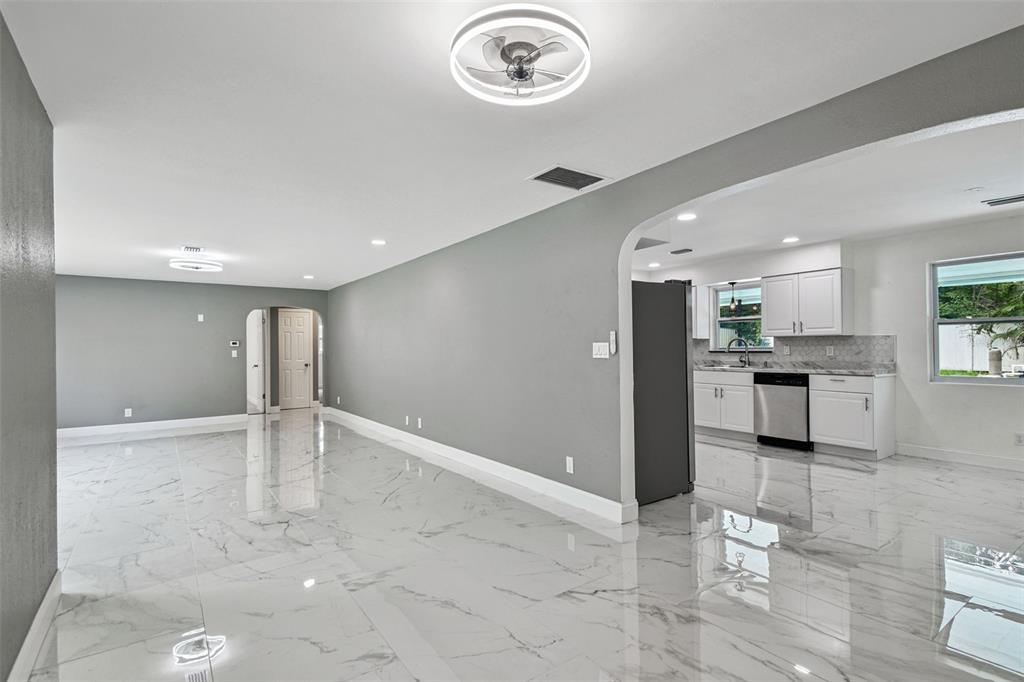 6016 Arthur Avenue New Port Richey, FL 34653 - Photo 14 of 33 a view of a kitchen with furniture and a kitchen