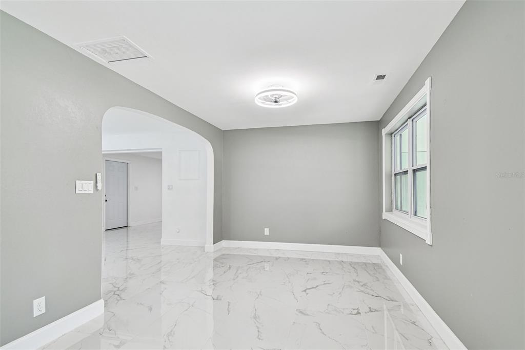 6016 Arthur Avenue New Port Richey, FL 34653 - Photo 15 of 33 an empty room with windows and closet