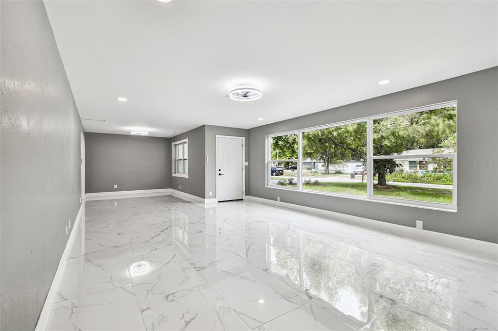 6016 Arthur Avenue New Port Richey, FL 34653 - Photo 6 of 33 a view of an empty room with a window