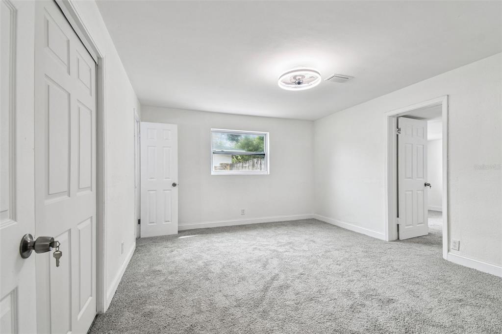 6016 Arthur Avenue New Port Richey, FL 34653 - Photo 9 of 33 a view of an empty room with a window