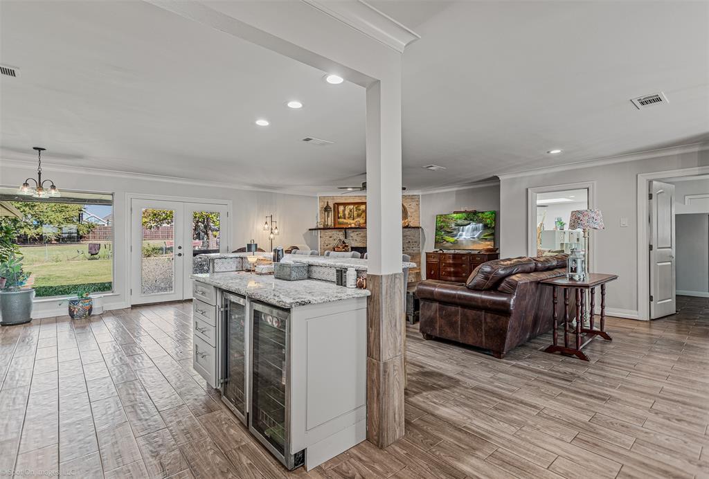3713 Hickox Road Rowlett, TX 75089 - Photo 13 of 36 a living room with furniture and a wooden floor