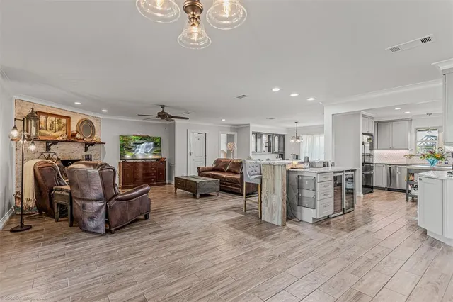 a view of a living room and bathroom