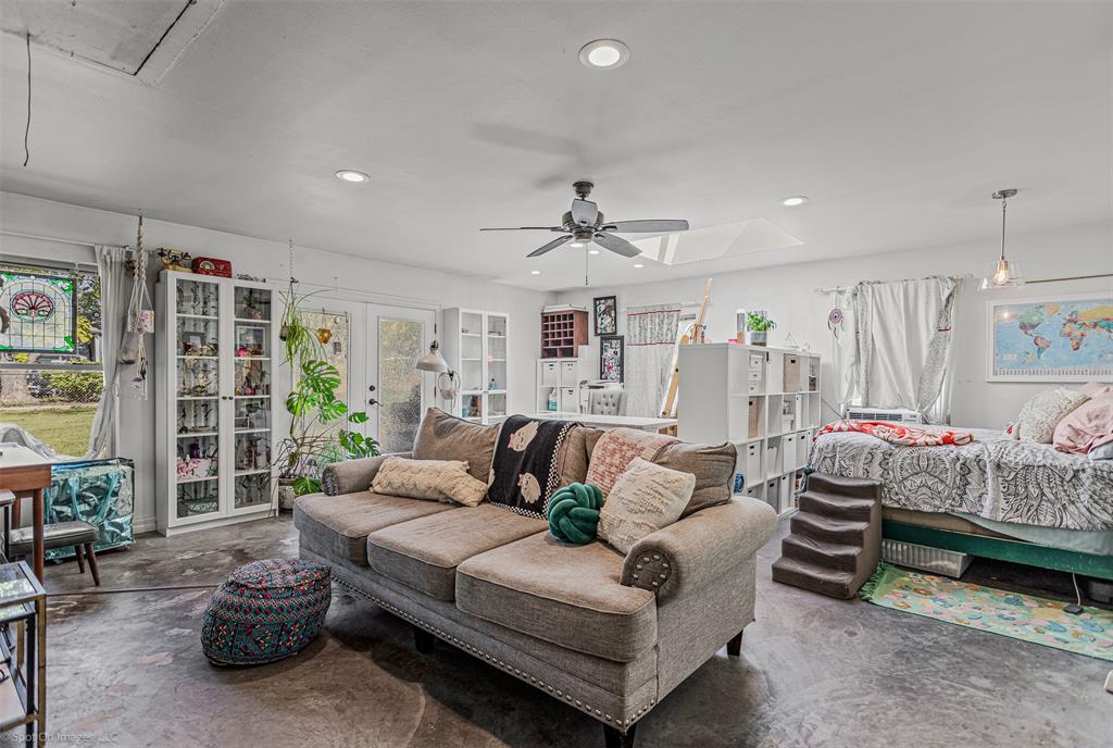 3713 Hickox Road Rowlett, TX 75089 - Photo 21 of 39 a living room with furniture and a large window