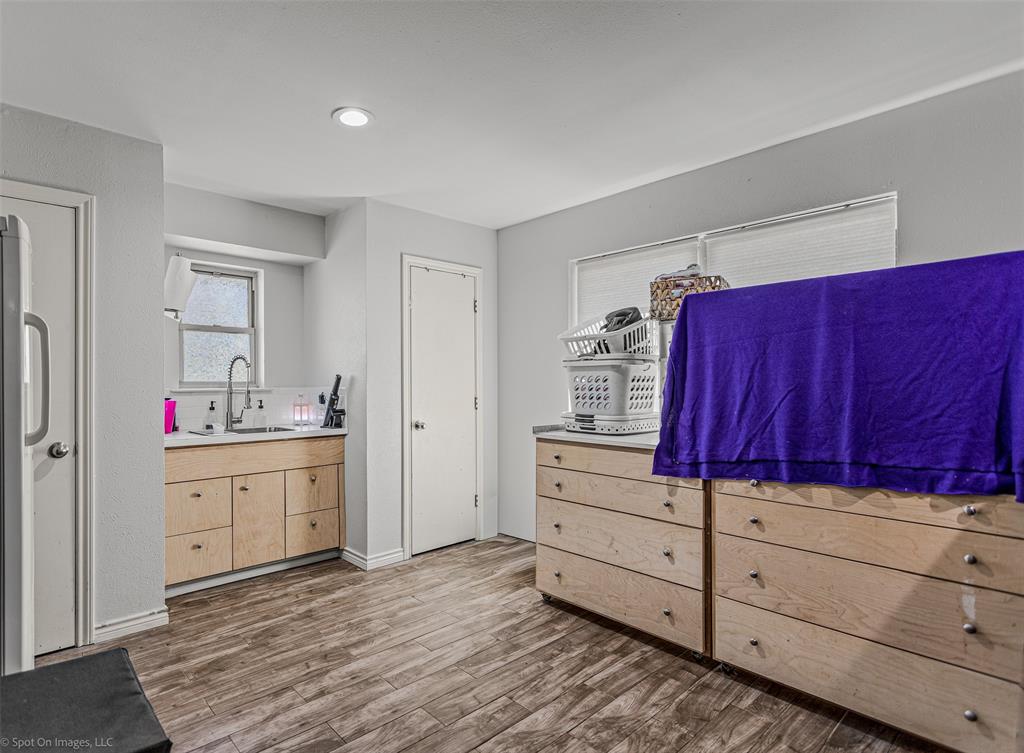 3713 Hickox Road Rowlett, TX 75089 - Photo 23 of 39 a room with a dresser and a window