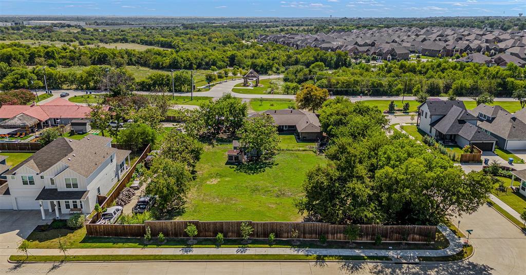 3713 Hickox Road Rowlett, TX 75089 - Photo 31 of 39 an aerial view of multiple houses with yard