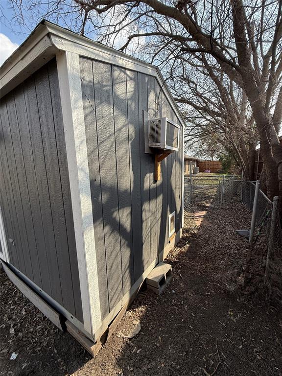 3713 Hickox Road Rowlett, TX 75089 - Photo 37 of 39 a view of a house with a yard