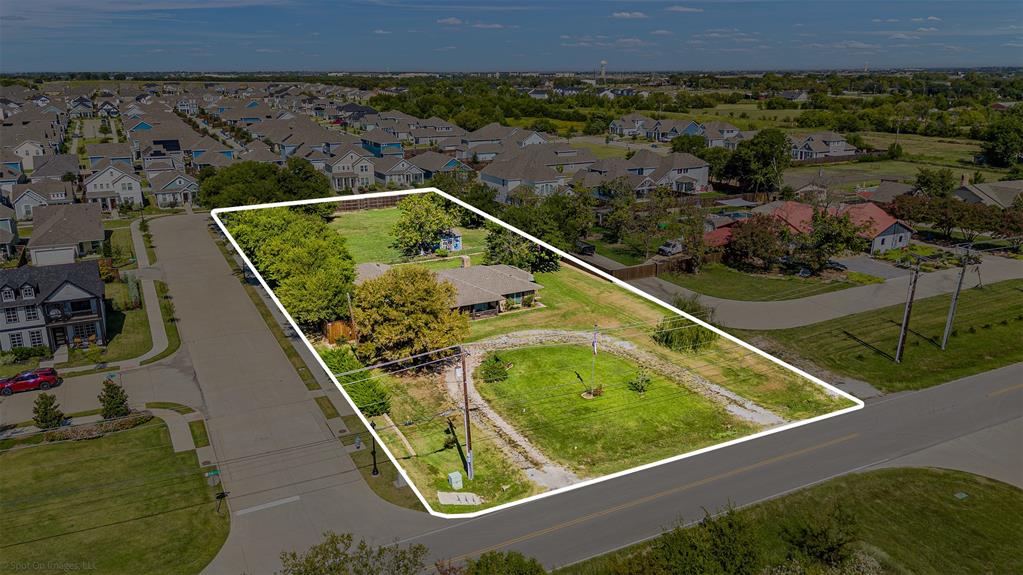 3713 Hickox Road Rowlett, TX 75089 - Photo 4 of 39 an aerial view of a house