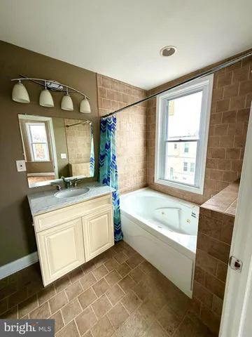 a view of a livingroom with wooden floor