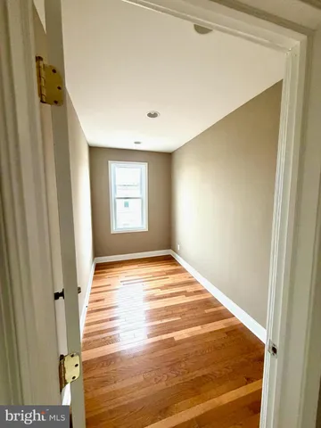 a view of empty room with windows