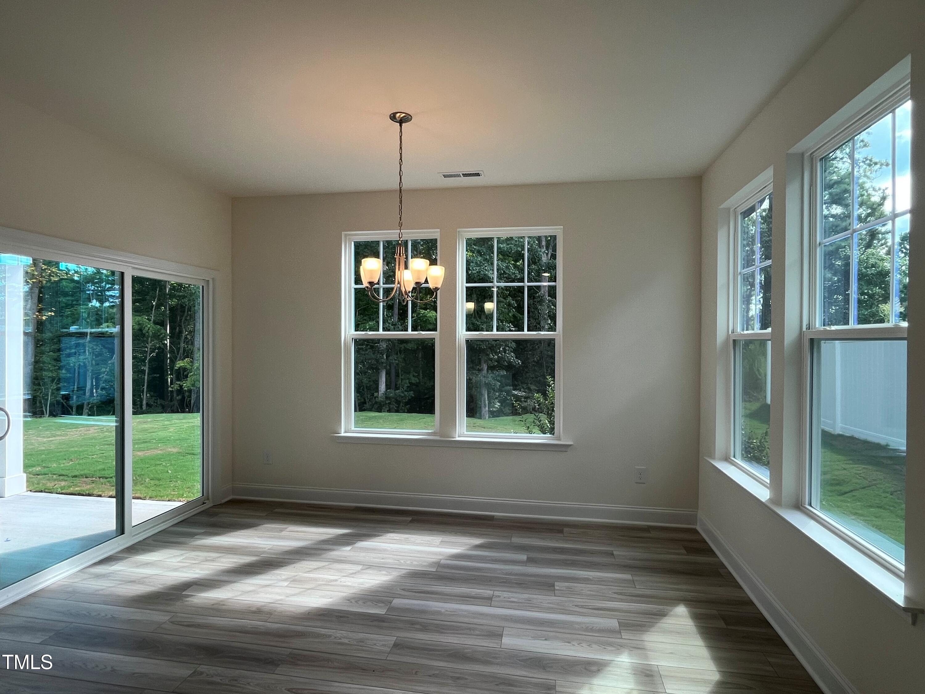5108 River Sand Trail Raleigh, NC 27604 - Photo 17 of 59 a view of an empty room with a window