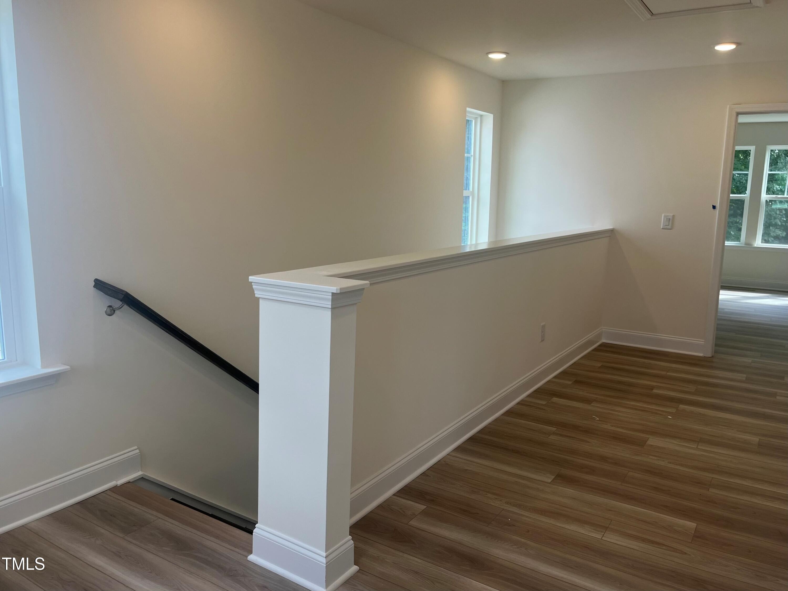5108 River Sand Trail Raleigh, NC 27604 - Photo 26 of 59 a view of an empty room with wooden floor