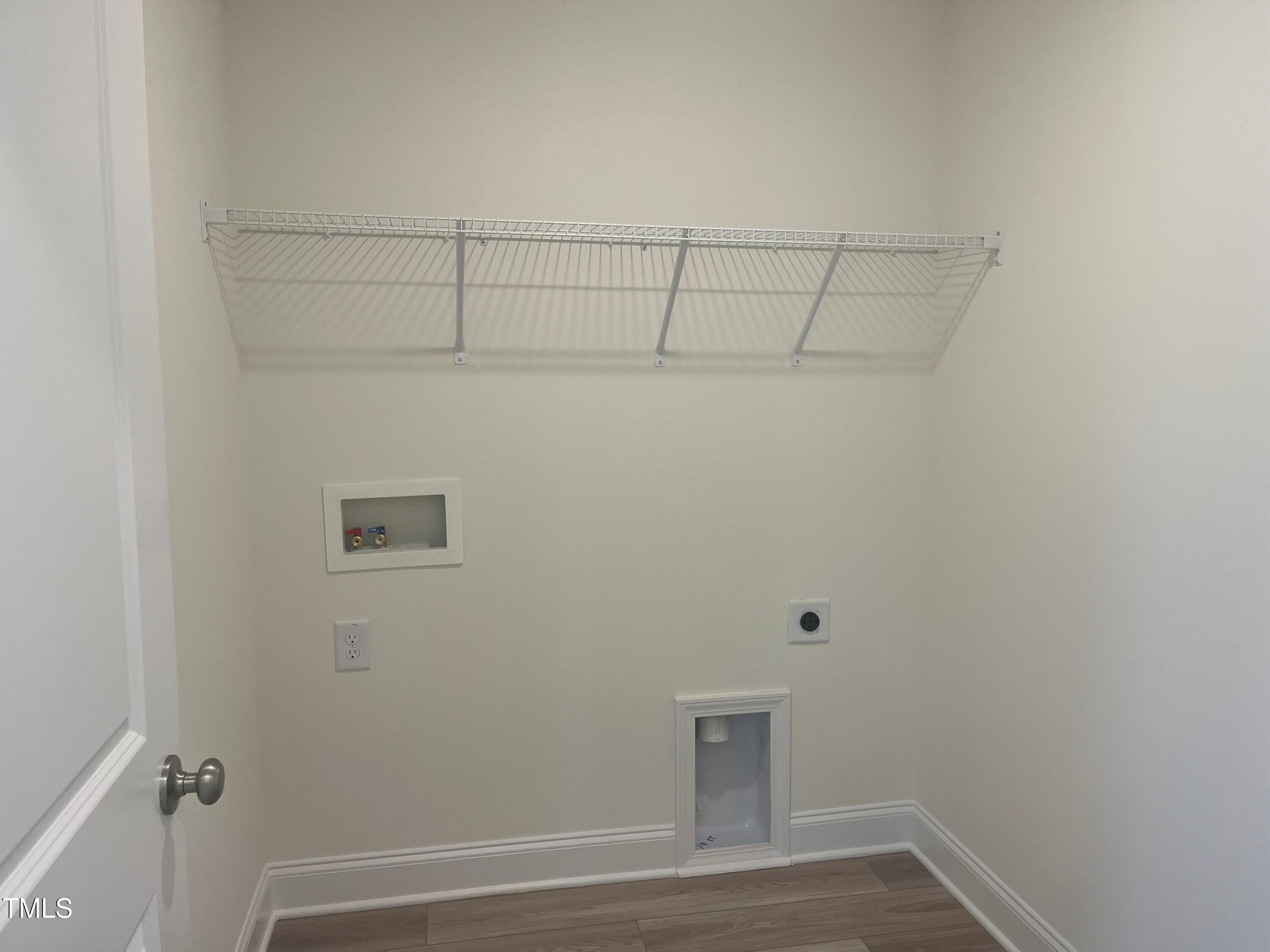 5108 River Sand Trail Raleigh, NC 27604 - Photo 32 of 59 a view of small space with empty racks on the wall