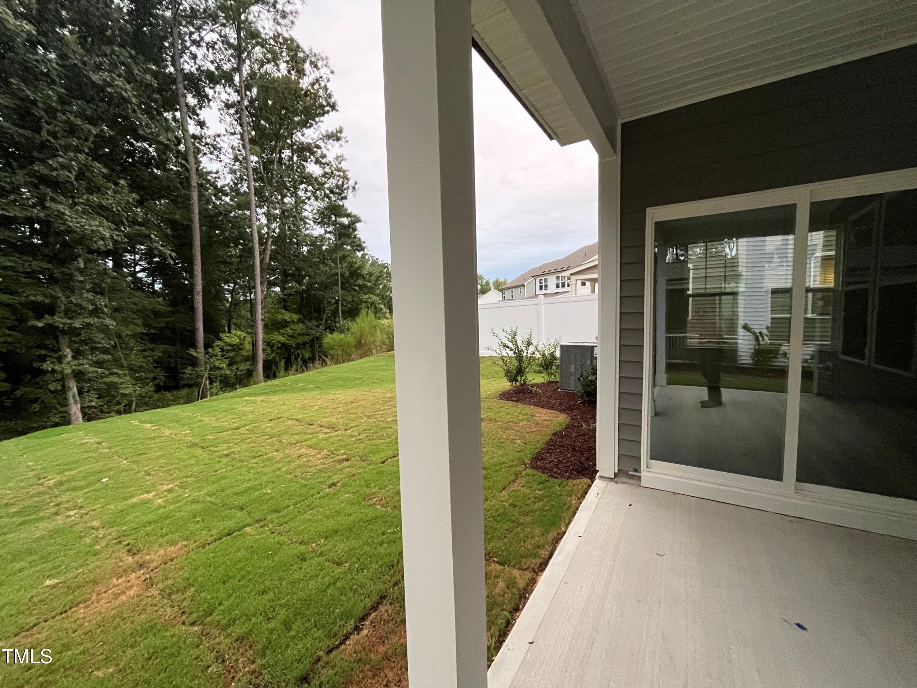 5108 River Sand Trail Raleigh, NC 27604 - Photo 4 of 59 a view of a glass door and a yard