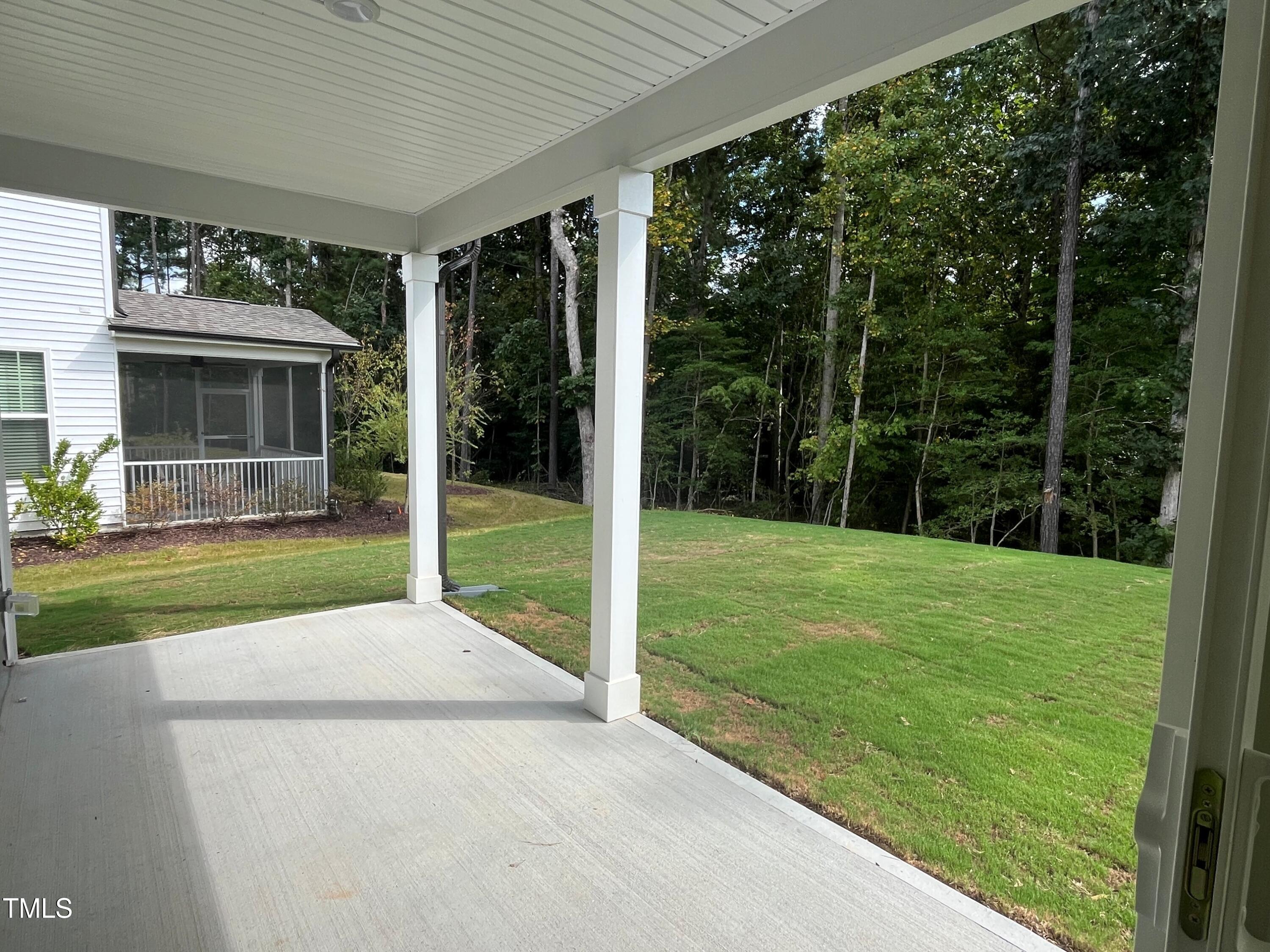 5108 River Sand Trail Raleigh, NC 27604 - Photo 6 of 59 a view of a backyard with garden