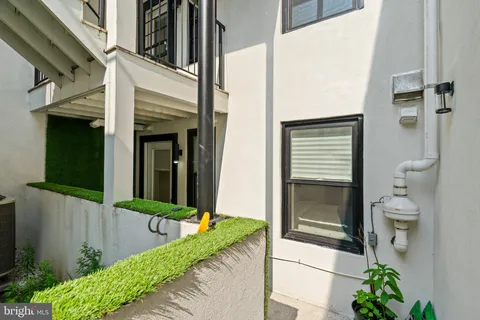 a house view with a outdoor space
