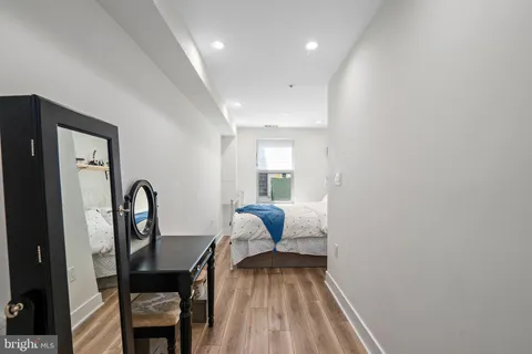 a view of a workspace with furniture and entryway