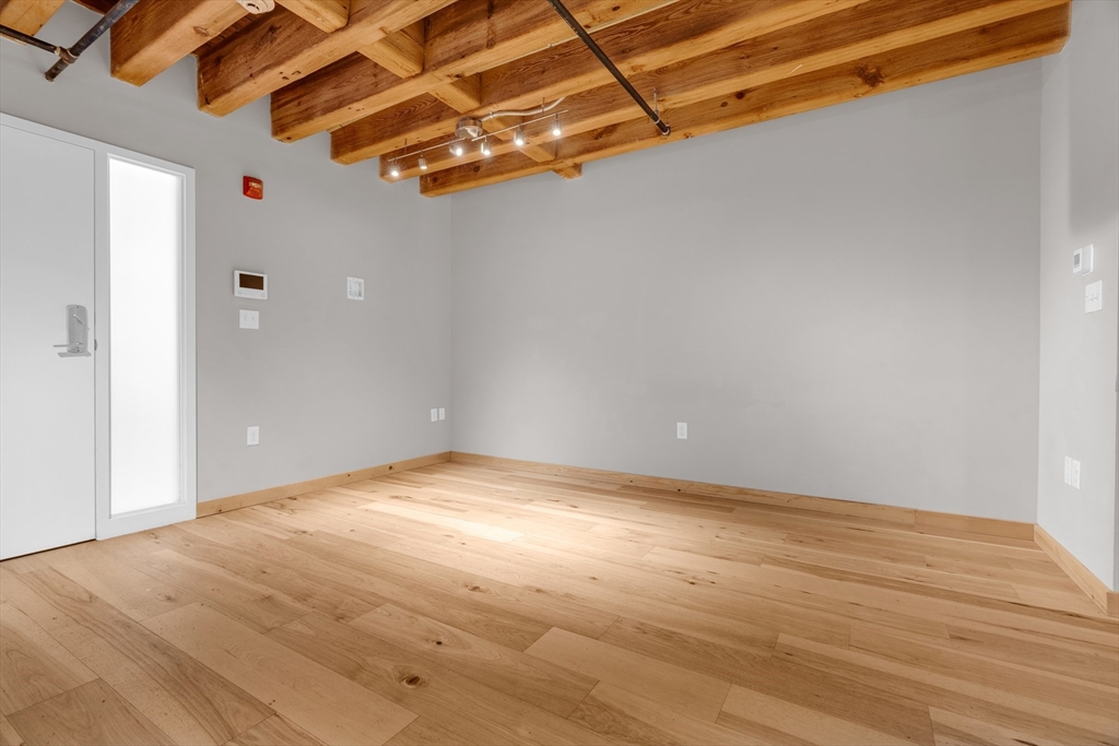 58 13th Street, Unit 112 Boston, MA 02129 - Photo 6 of 11 a view of an empty room