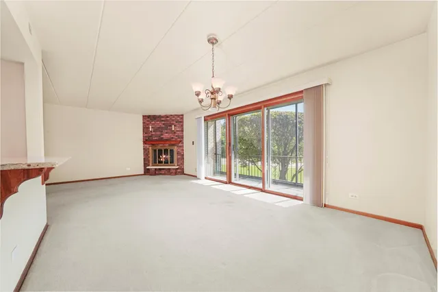 a view of a room with a large window