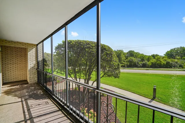 a view of a balcony with lake view
