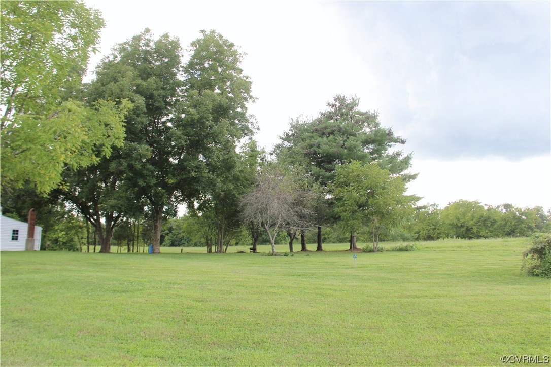 132 Carter Road Cumberland, VA 23040 - Photo 12 of 45 a view of outdoor space with green field and trees