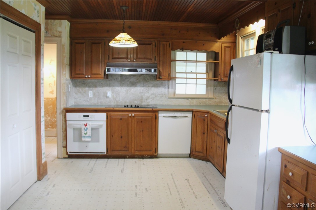 132 Carter Road Cumberland, VA 23040 - Photo 26 of 45 a kitchen with a sink a refrigerator and window